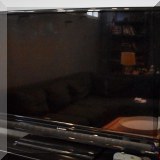 E08. Mitsubishi 52” TV. 